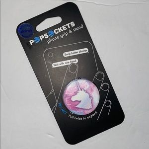 😊FREE😊W/ $25 Purchase - Pop Socket w/a fun pink unicorn to protect your phone
